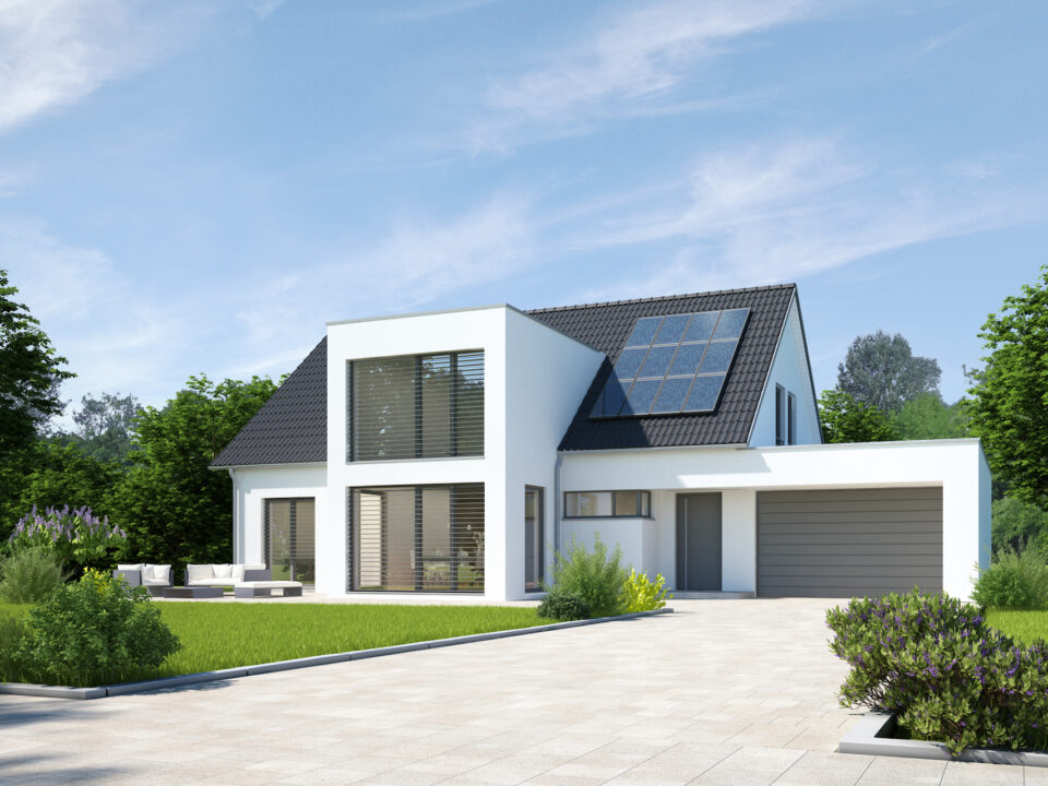 A new home displaying energy efficient features and solar panels - energy tips for new homes