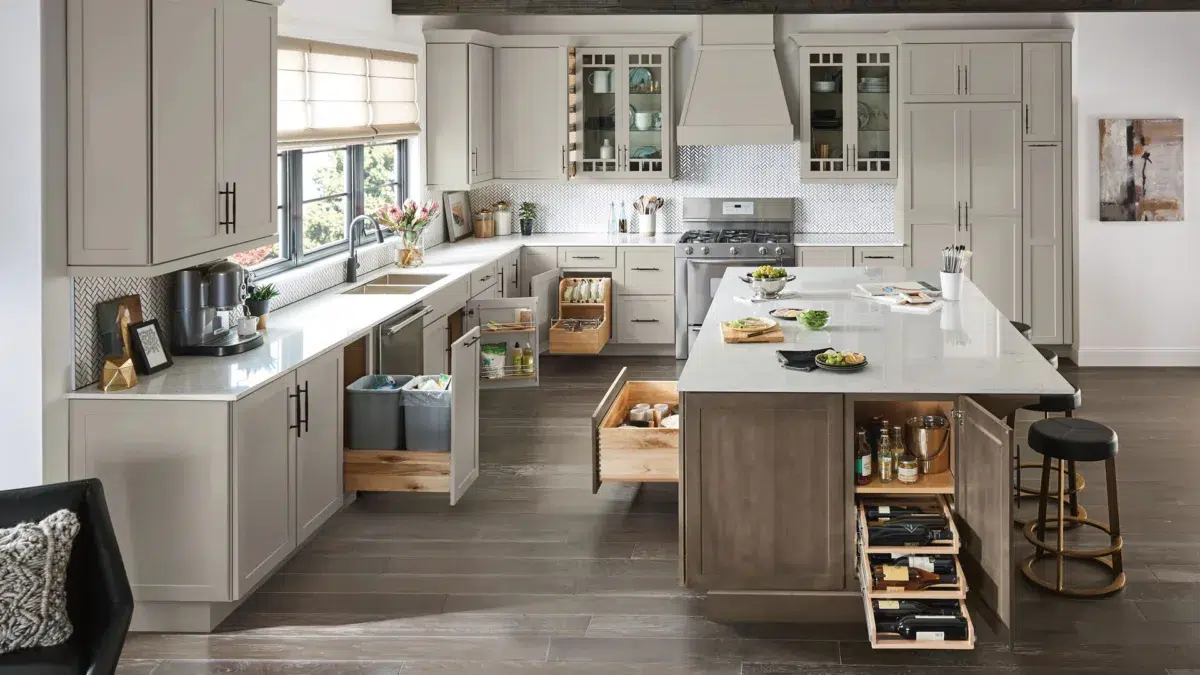 cool tone oak kitchen cabinetry with pull out cabinets